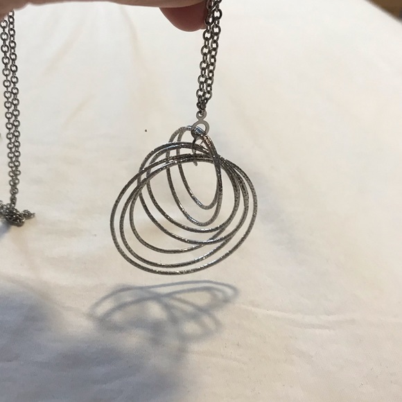 Long silver tone necklace with circle pendant - Picture 3 of 3